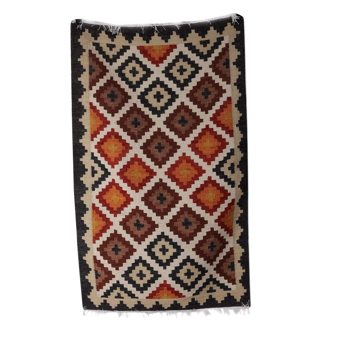 Handloomed Diamond-Patterned Alabaster and Black Wool Rug - Paradise Enchantment
