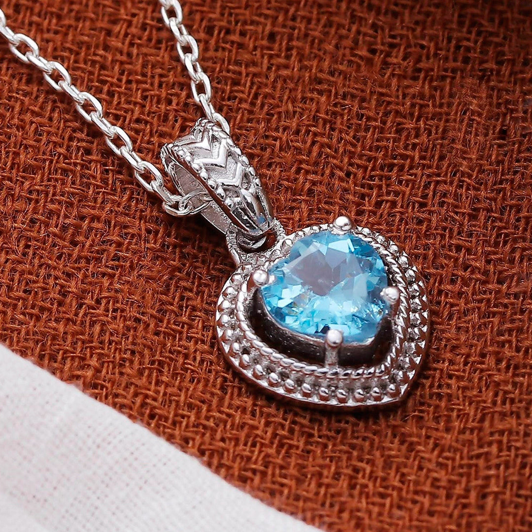 Heart-Shaped Faceted Two-Carat Blue Topaz Pendant Necklace - Iridescent Heart