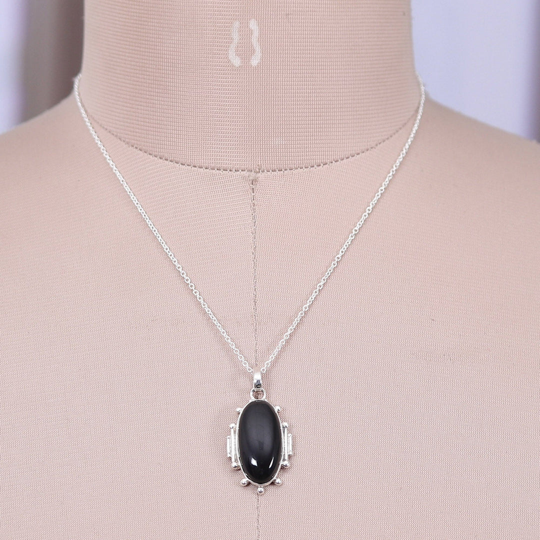 Polished Oval Onyx Cabochon Pendant Necklace from India - Nocturnal Muse