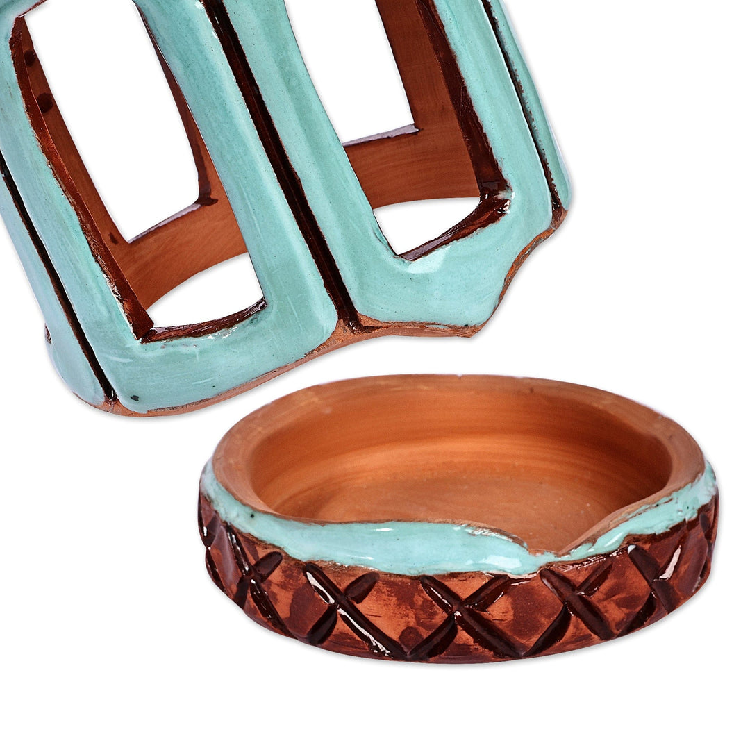 Handcrafted Traditional Blue and Brown Ceramic Candleholder - Serene Beacon